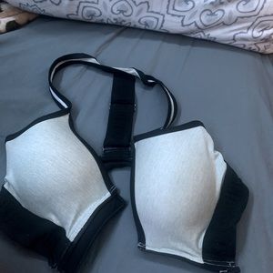 Pink zip up sports bra